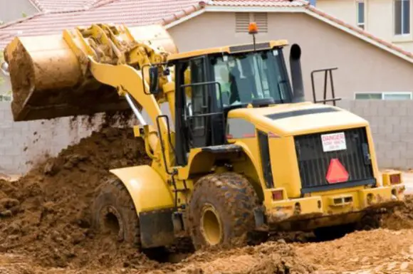 Earth moving tractor