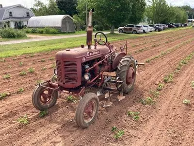 Large older tractor on field