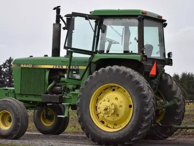 John Deere Tractor with ROPS enclosure