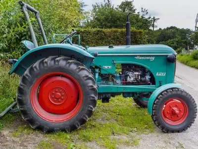 Parked Green and Red Tractor